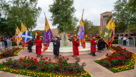 Members of the USC community carrying flags from all the schools during the 2018 commencement. 